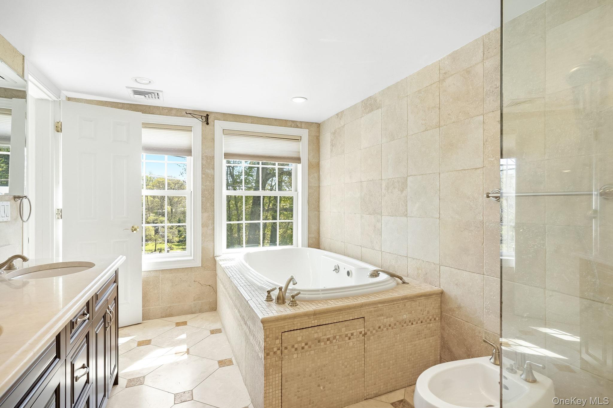 60 Hillside Lane New Rochelle, NY 10804 - Photo 25 of 44 a bathroom with a sink toilet and shower