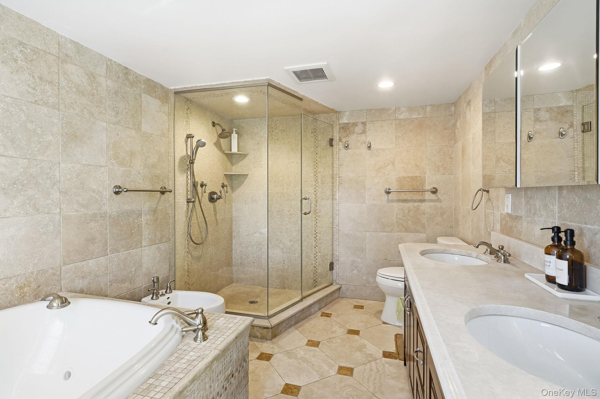 60 Hillside Lane New Rochelle, NY 10804 - Photo 26 of 44 a bathroom with a sink a toilet and shower