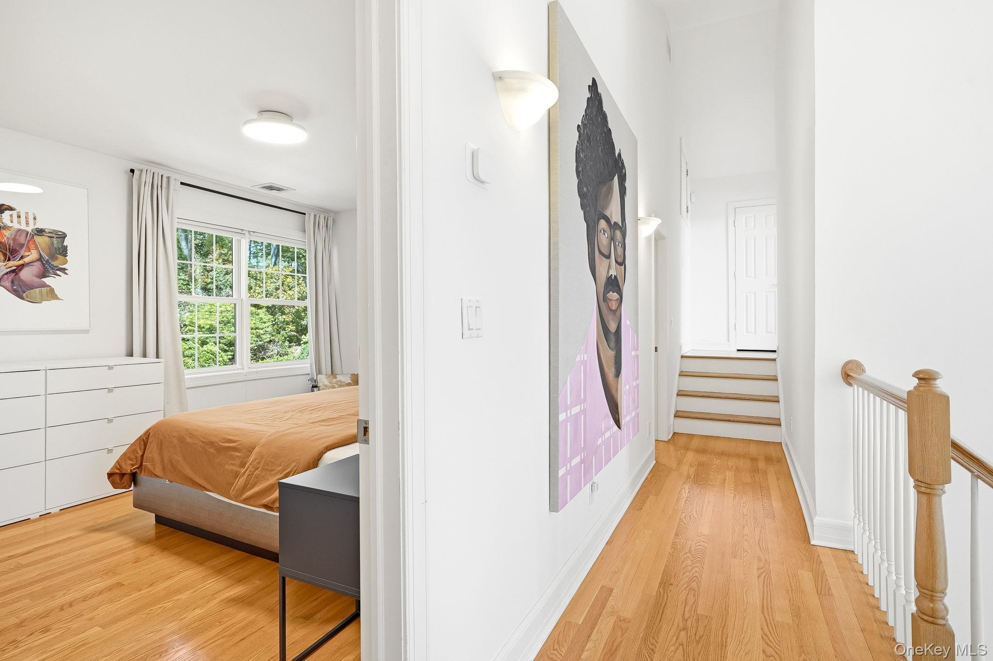 60 Hillside Lane New Rochelle, NY 10804 - Photo 27 of 44 a bedroom with a bed and a window