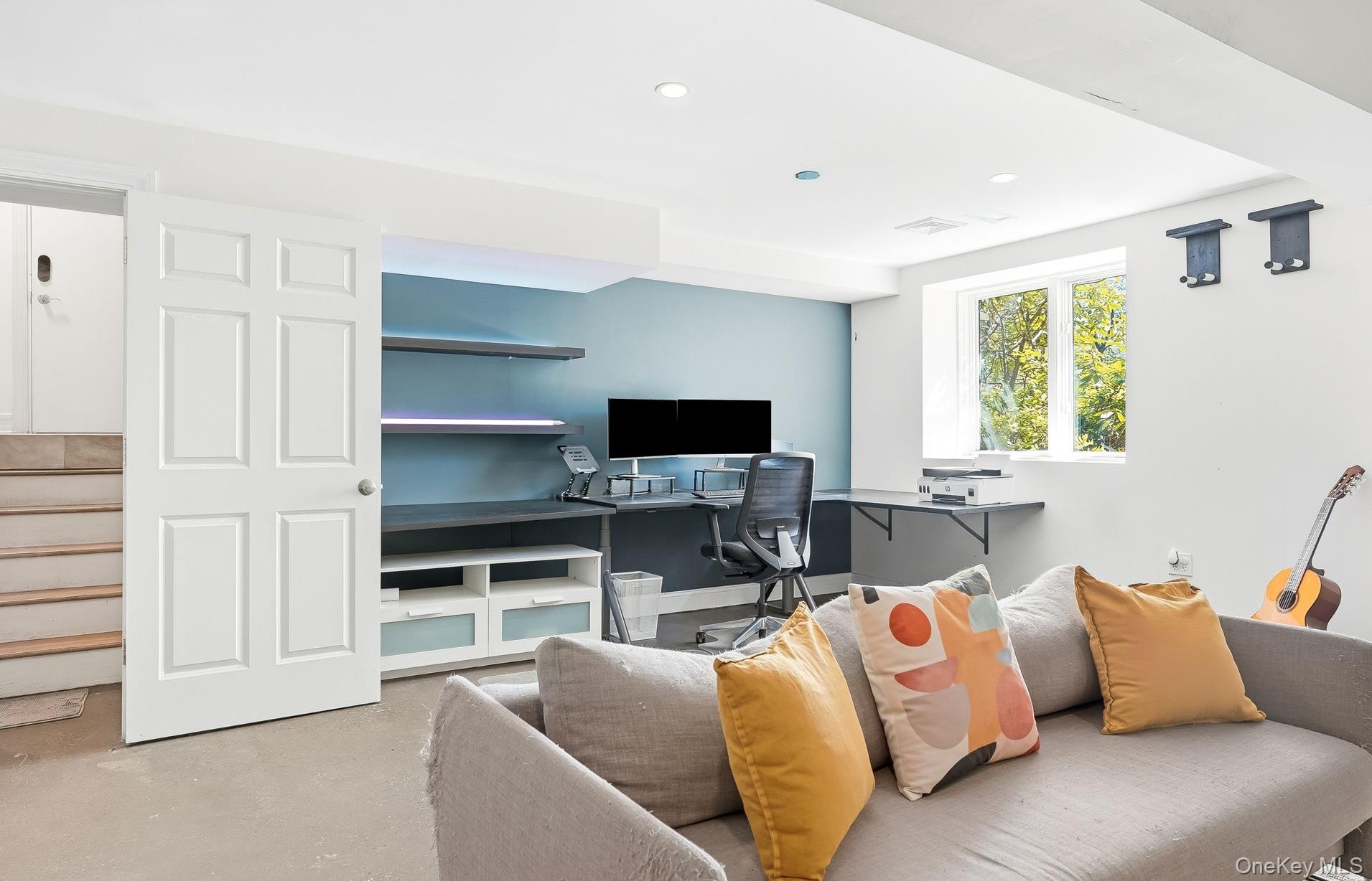 60 Hillside Lane New Rochelle, NY 10804 - Photo 36 of 44 a living room with furniture and a flat screen tv