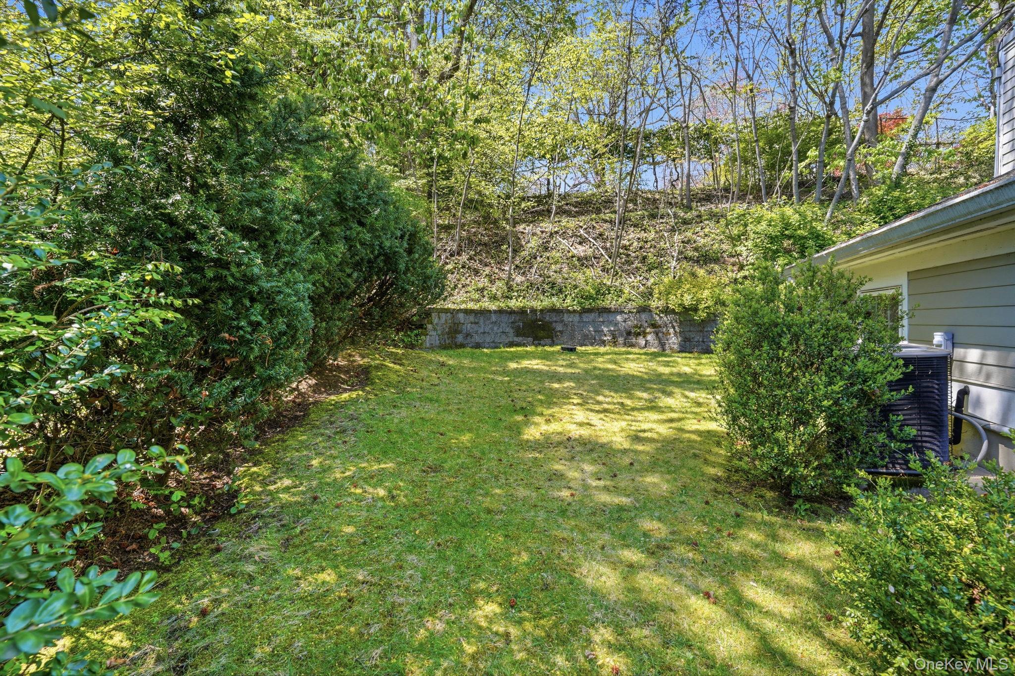 60 Hillside Lane New Rochelle, NY 10804 - Photo 40 of 44 a view of a yard with an outdoor space
