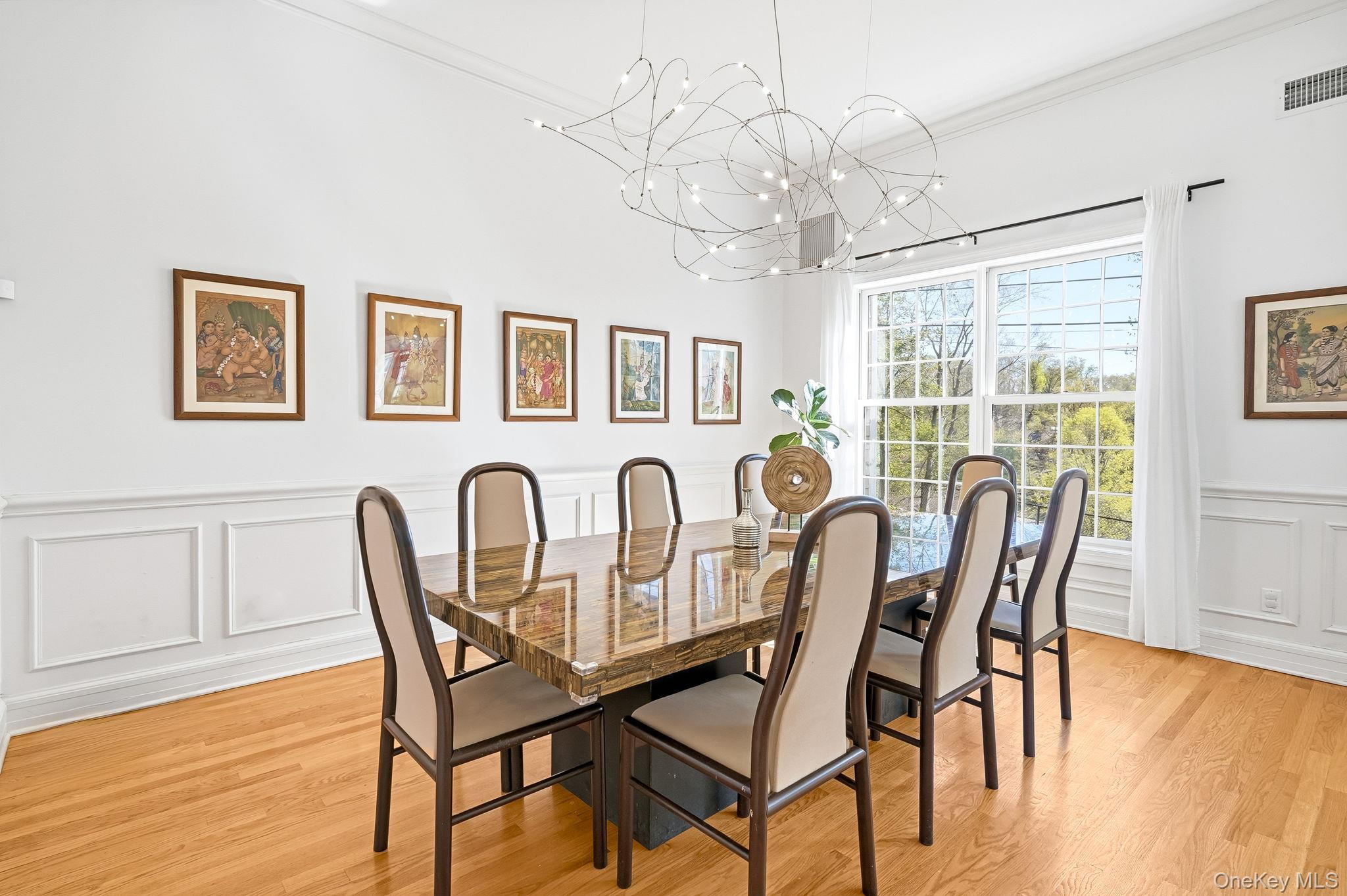 60 Hillside Lane New Rochelle, NY 10804 - Photo 9 of 44 a view of a dining room with furniture window and wooden floor