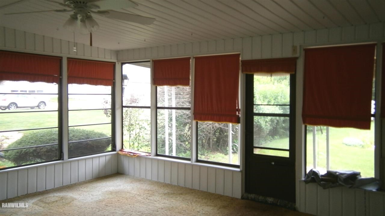 314 South Ridge Street Shannon, IL 61078 - Photo 6 of 15 a view of an empty room with a window
