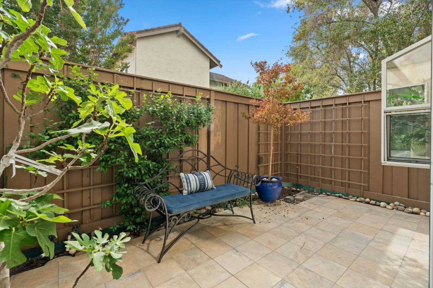 1032 Strayer Drive San Jose, CA 95129 - Photo 15 of 31 a blue bench sitting in front of a house