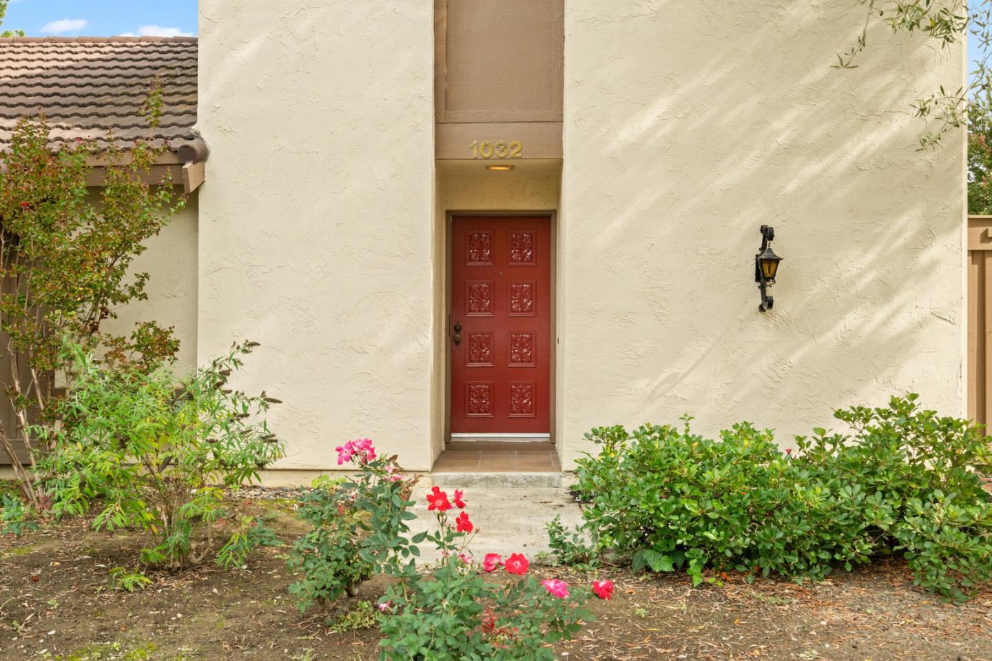 1032 Strayer Drive San Jose, CA 95129 - Photo 2 of 31 a flower plants in front of a door