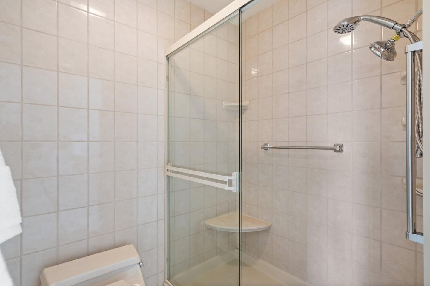 1032 Strayer Drive San Jose, CA 95129 - Photo 24 of 31 a bathroom with a shower and toilet