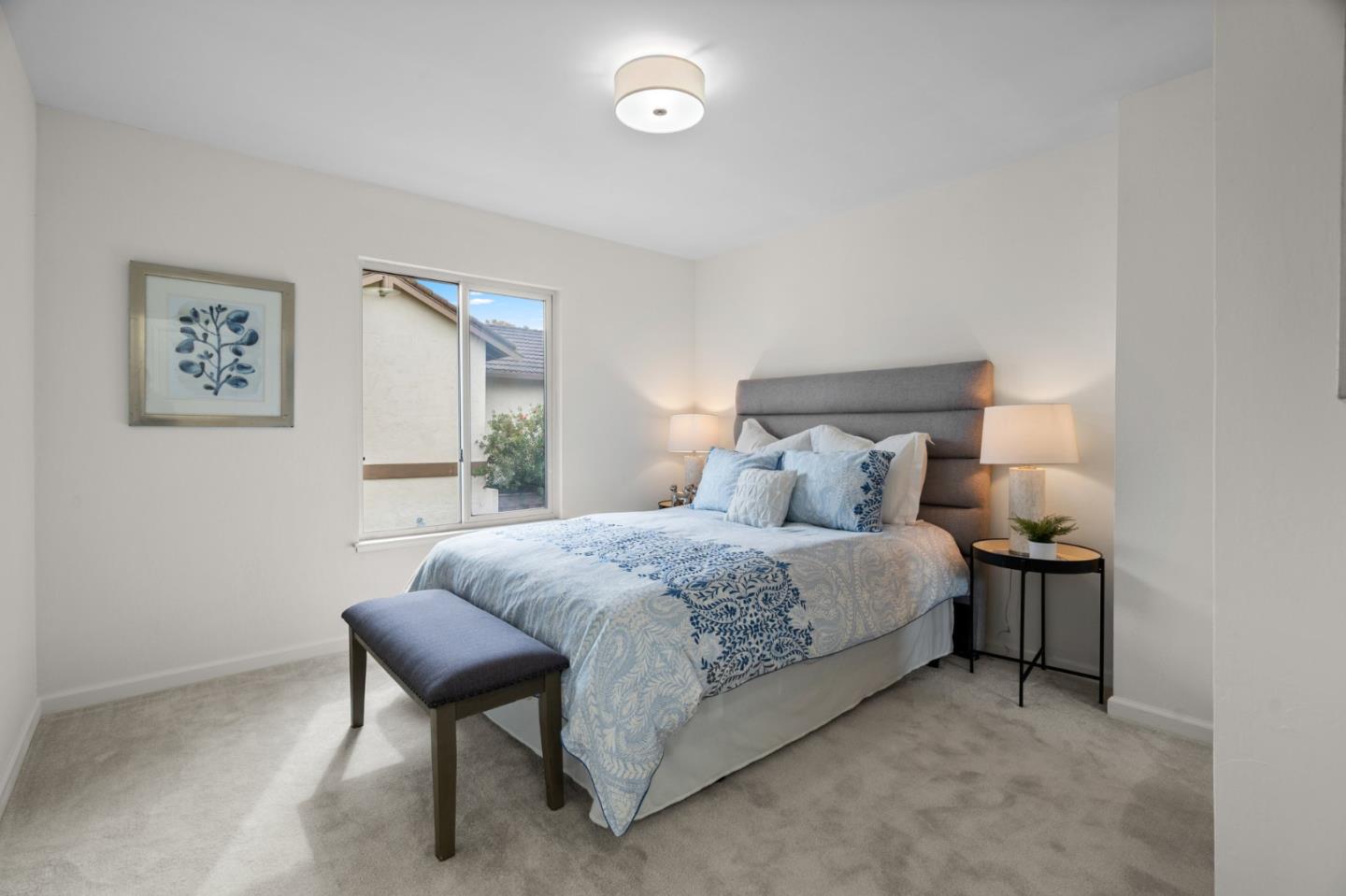 1032 Strayer Drive San Jose, CA 95129 - Photo 25 of 31 a bedroom with a bed and a table