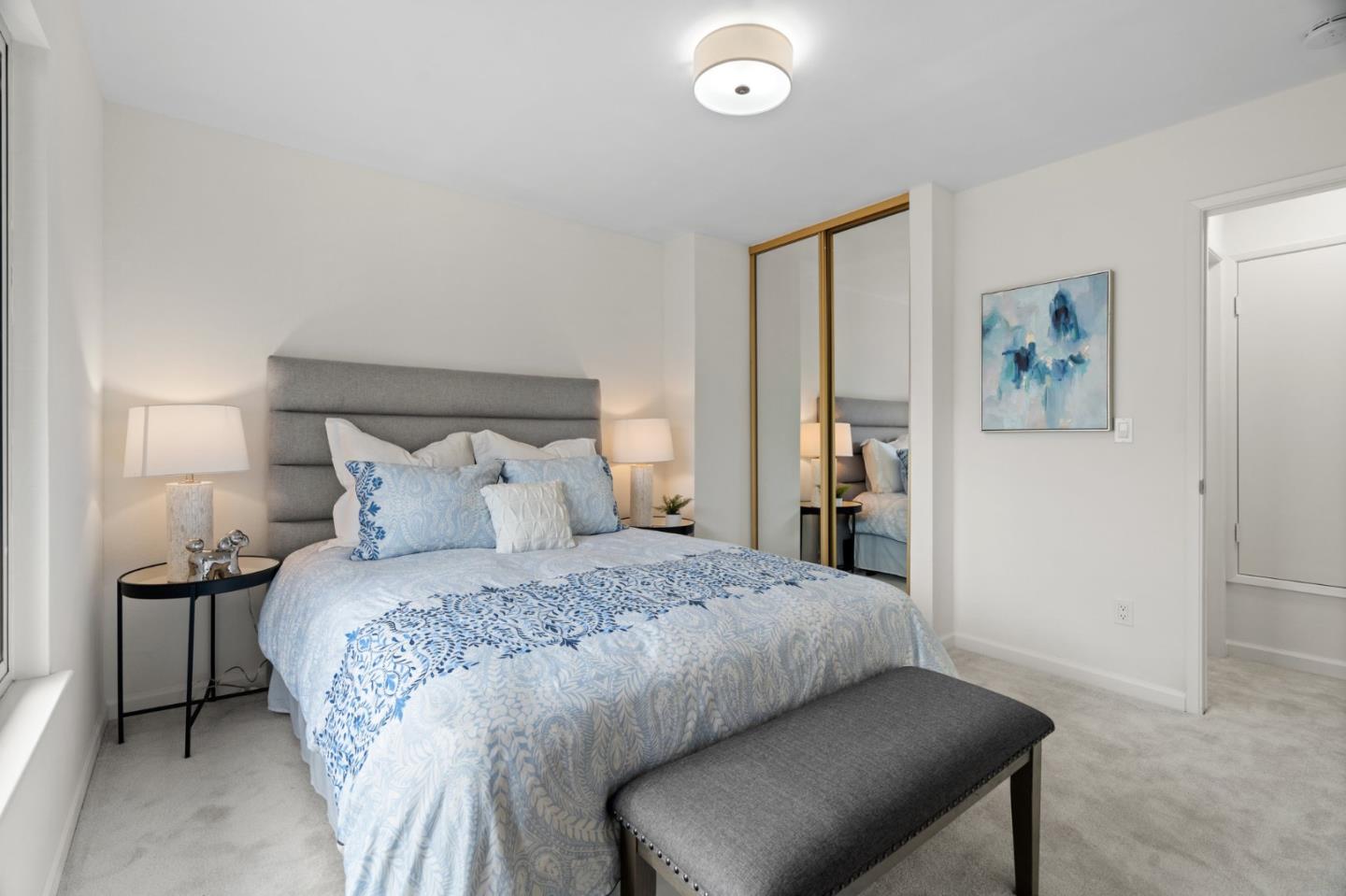 1032 Strayer Drive San Jose, CA 95129 - Photo 26 of 31 a bedroom with a bed and a painting on the wall