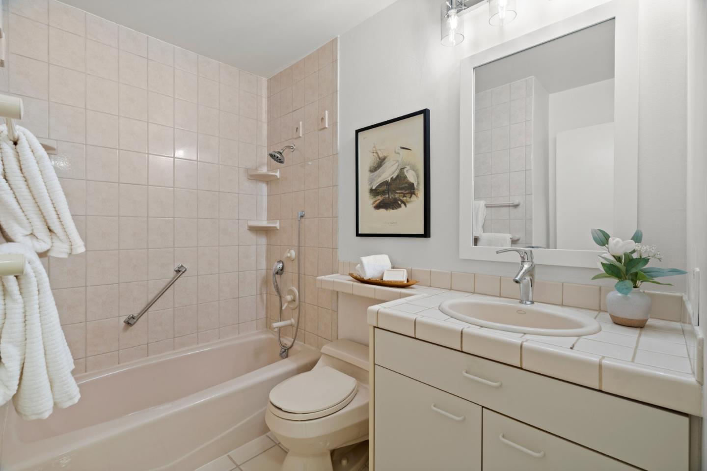 1032 Strayer Drive San Jose, CA 95129 - Photo 27 of 31 a bathroom with a sink toilet and shower