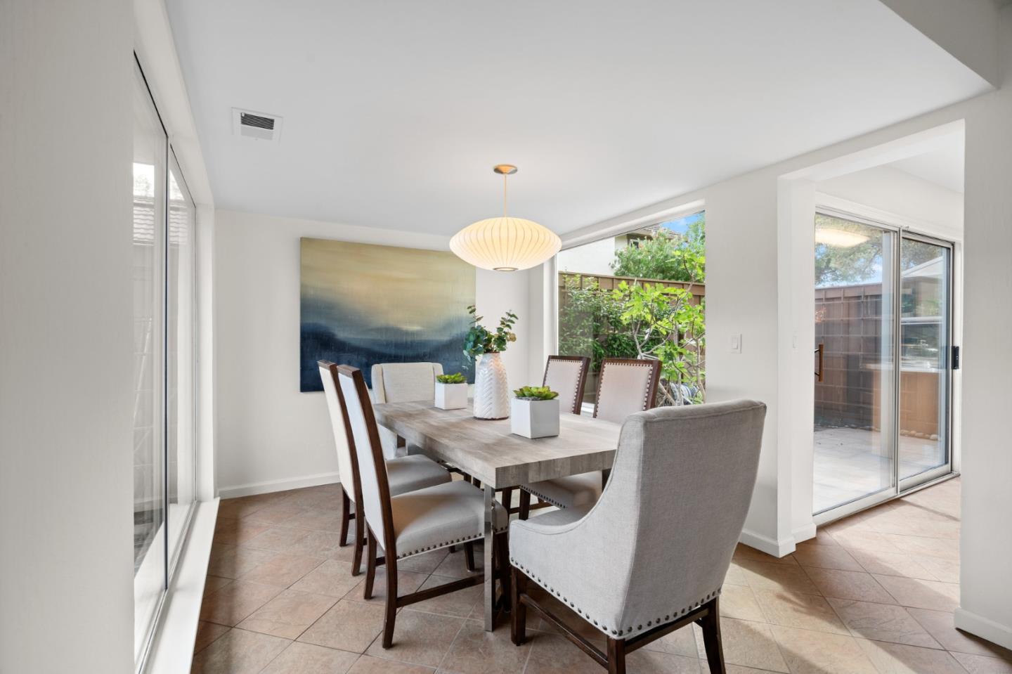 1032 Strayer Drive San Jose, CA 95129 - Photo 7 of 31 a view of a dining room with furniture window and outside view