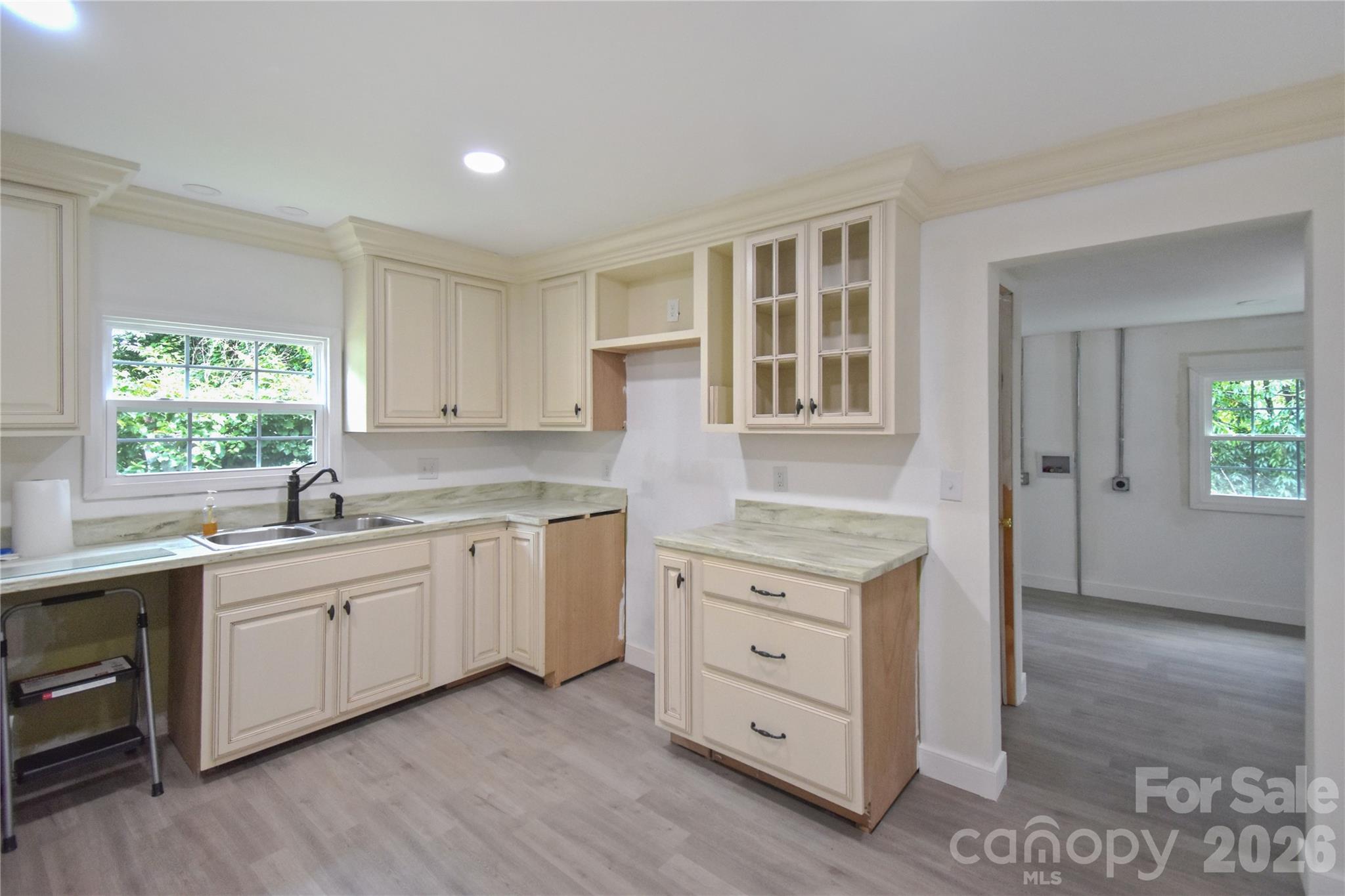 622 Green St Loop Marion, NC 28752 - Photo 4 of 16 a kitchen that has a sink and a stove in it
