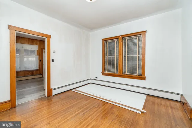 a view of livingroom with furniture and wooden floor