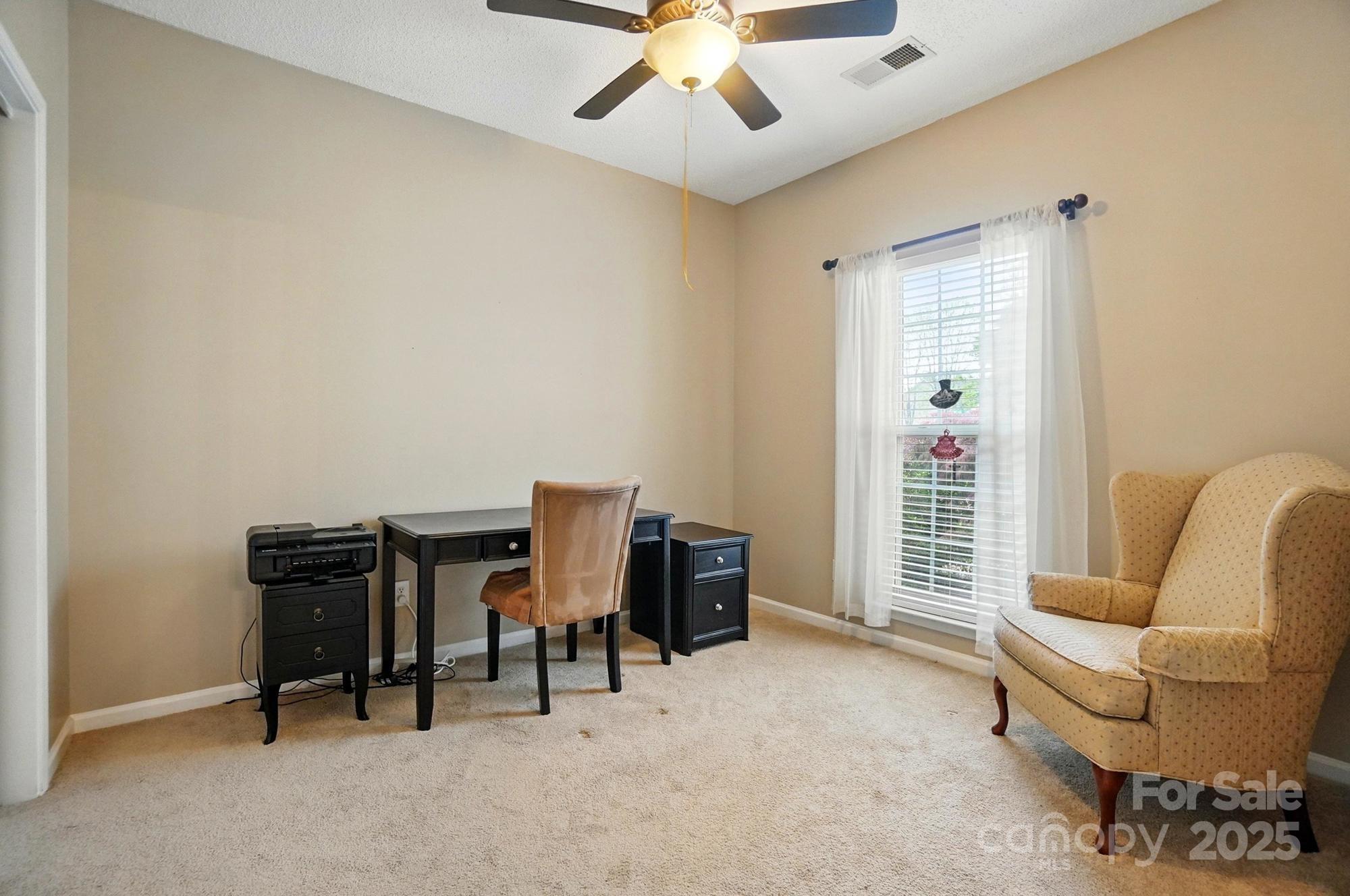 13505 Michael Lynn Road Charlotte, NC 28278 - Photo 20 of 24 a workspace with furniture and a window
