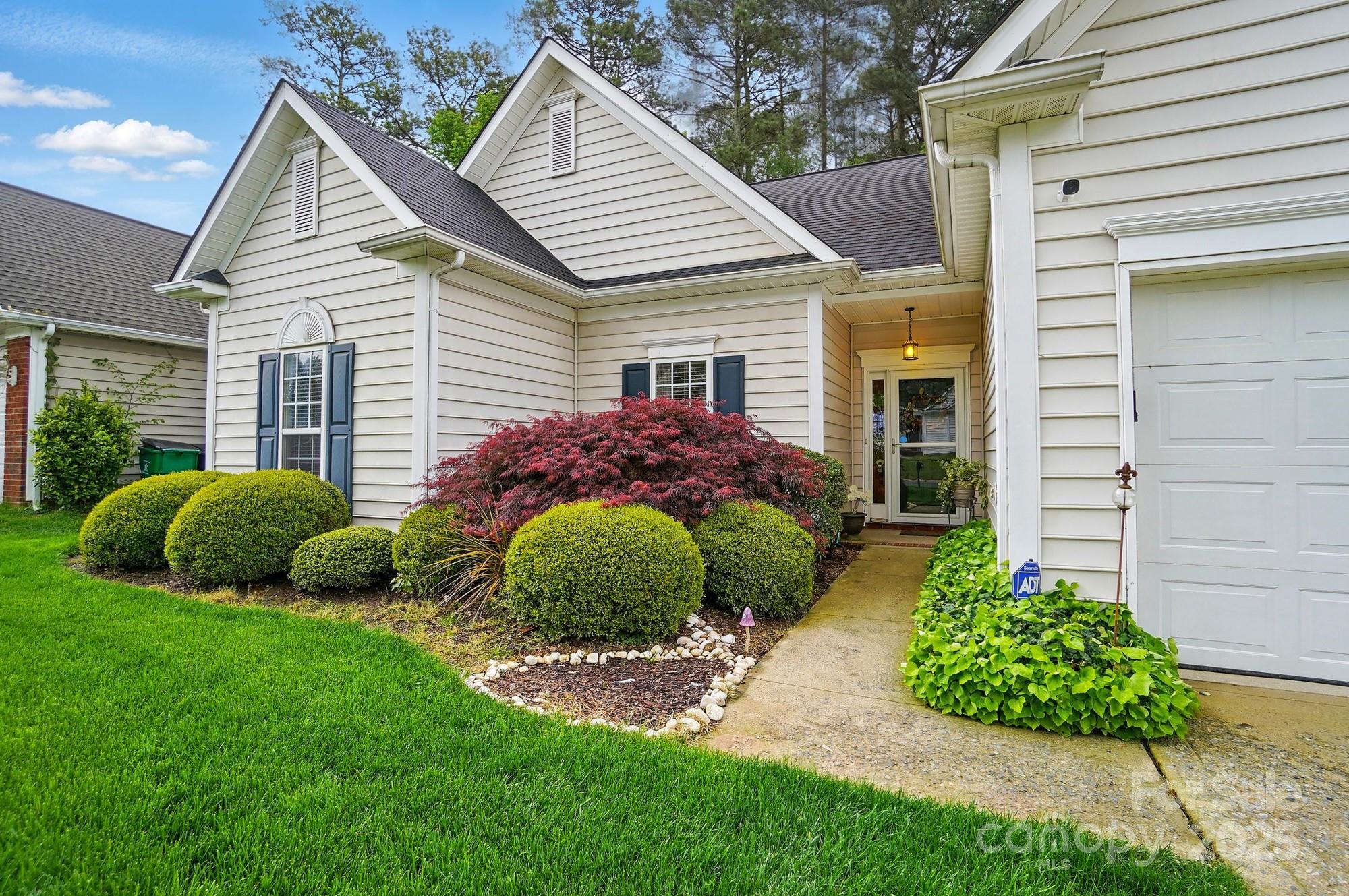 13505 Michael Lynn Road Charlotte, NC 28278 - Photo 2 of 24 a view of a house with a backyard and plants