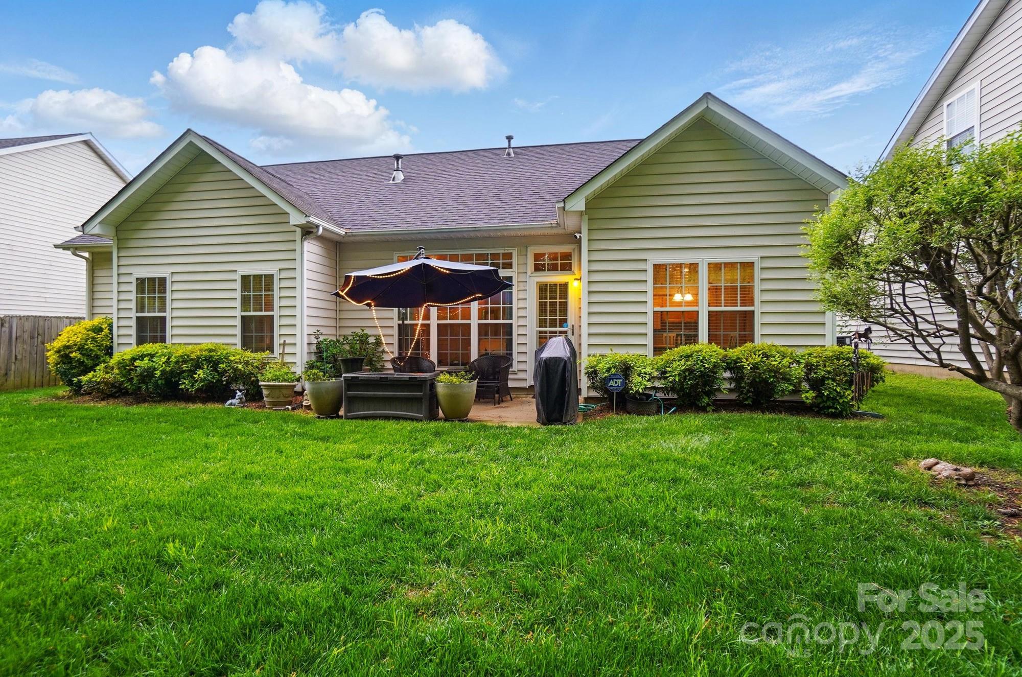 13505 Michael Lynn Road Charlotte, NC 28278 - Photo 21 of 24 a view of a house with backyard