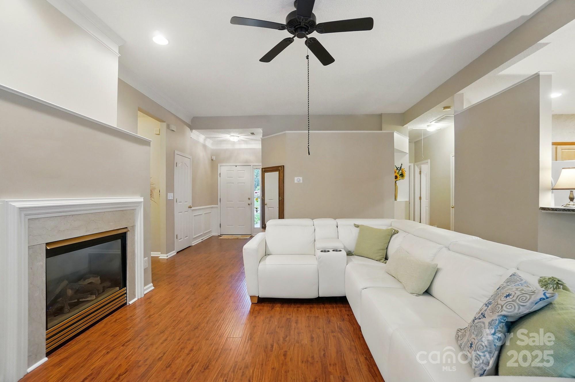 13505 Michael Lynn Road Charlotte, NC 28278 - Photo 5 of 24 a living room with furniture and a fireplace