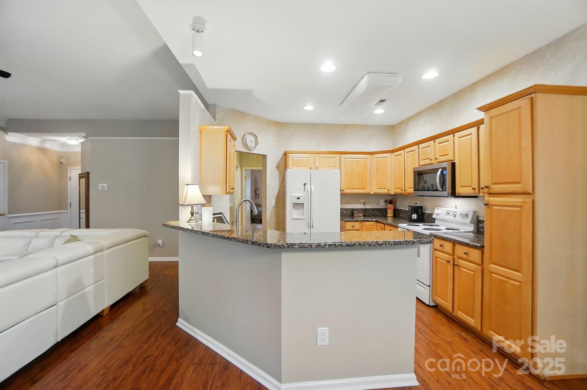 13505 Michael Lynn Road Charlotte, NC 28278 - Photo 6 of 24 a kitchen with stainless steel appliances a sink stove and refrigerator