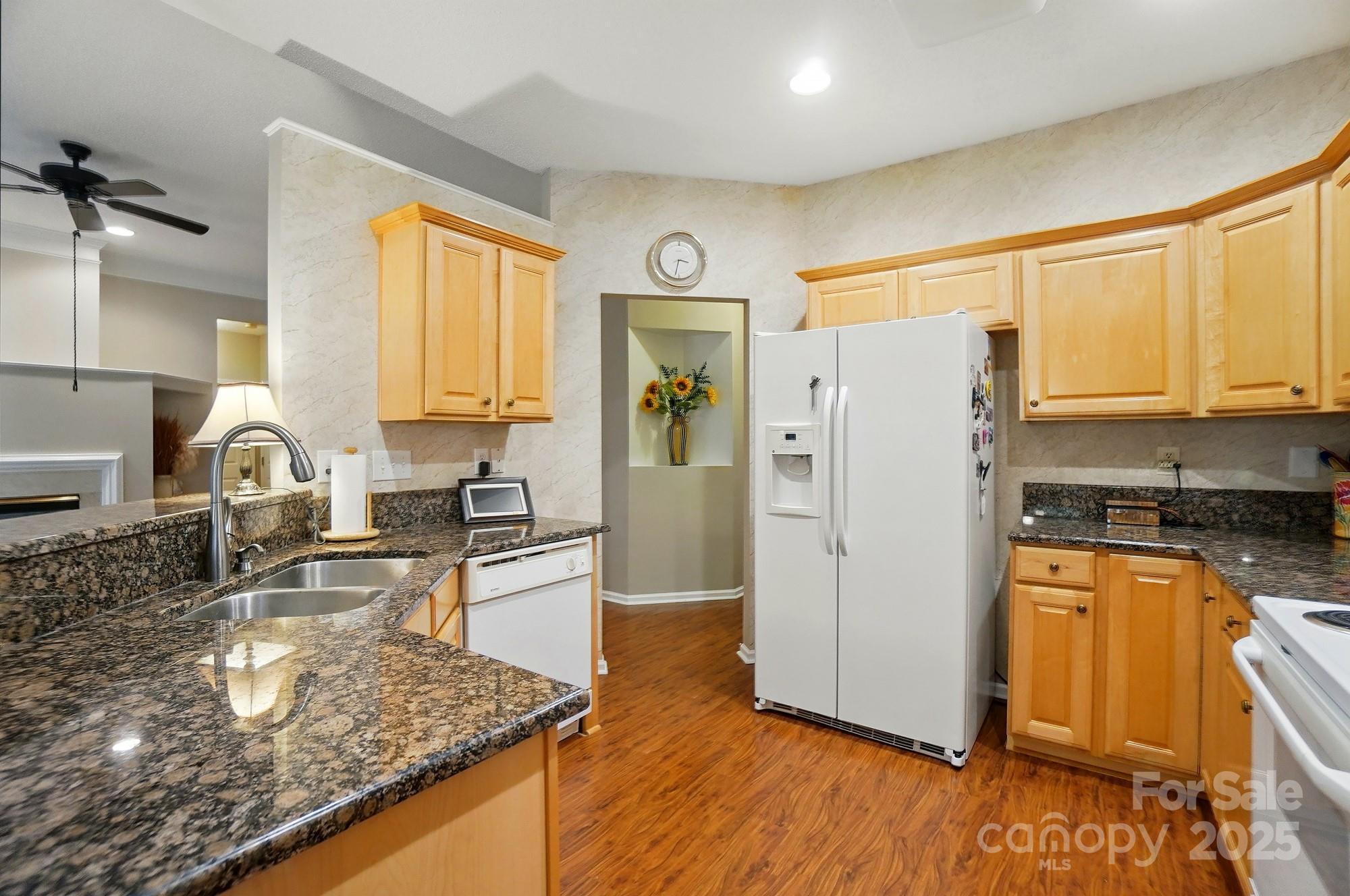 13505 Michael Lynn Road Charlotte, NC 28278 - Photo 10 of 24 a kitchen with stainless steel appliances granite countertop a refrigerator sink and stove