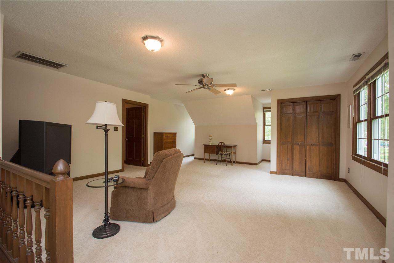 8000 Running Cedar Trail Raleigh, NC 27615 - Photo 13 of 18 a view of a livingroom with furniture and windows
