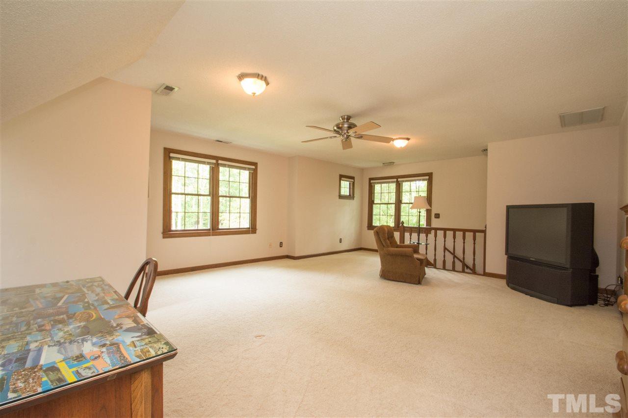 8000 Running Cedar Trail Raleigh, NC 27615 - Photo 14 of 18 a big room with windows and closet
