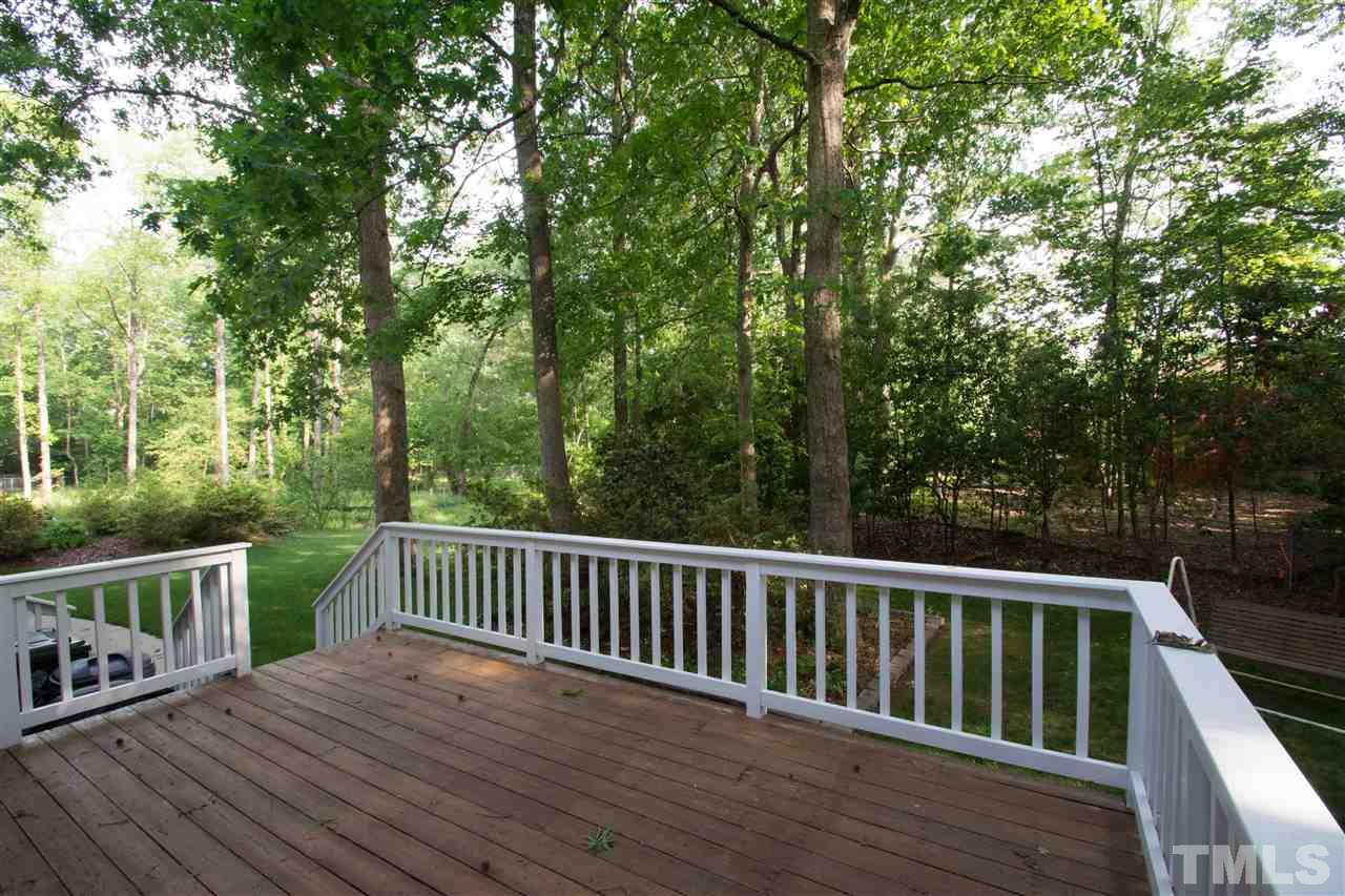 8000 Running Cedar Trail Raleigh, NC 27615 - Photo 18 of 18 a view of balcony with wooden floor and fence
