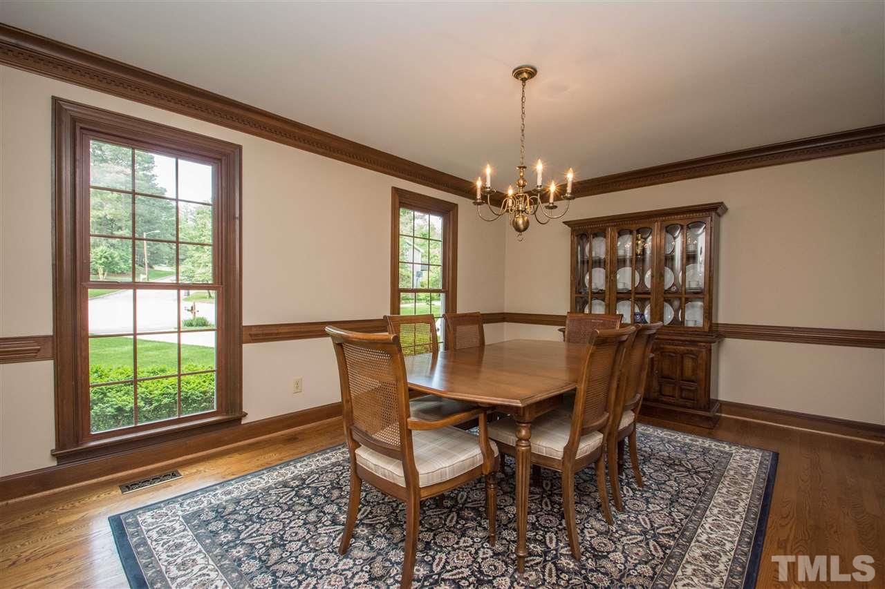8000 Running Cedar Trail Raleigh, NC 27615 - Photo 8 of 18 a view of a dining room with furniture and window