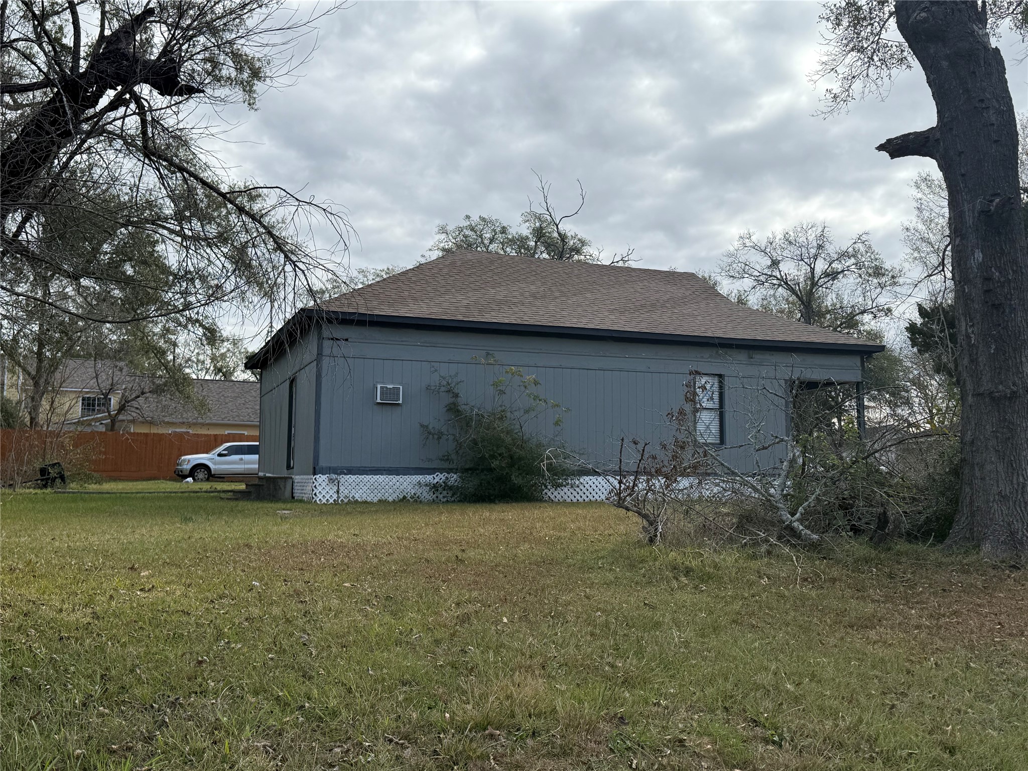 412 Waco Street Conroe, TX 77301 - Photo 15 of 50 a view of a house with a yard and plants