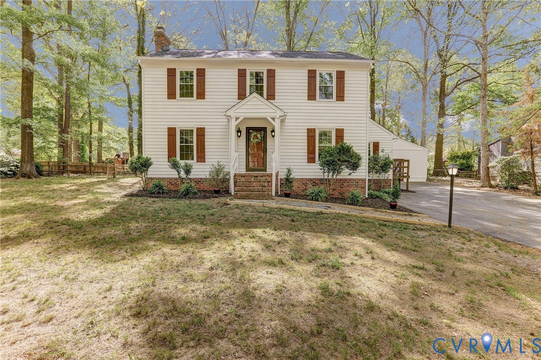 661 Greencastle Road Chesterfield, VA 23236 - Photo 1 of 28 a view of white house with a yard