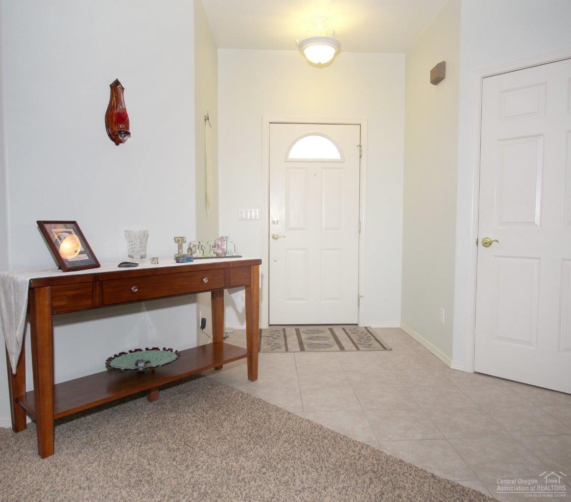 381 Southeast Soft Tail Loop Bend, OR 97702 - Photo 5 of 24 The entry foyer with guest coat closet a