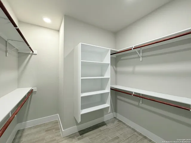 a room with walk in closet