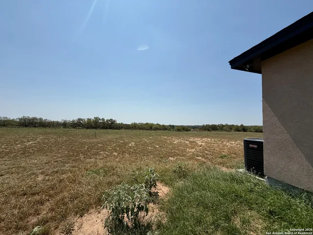 a view of lake with mountain in the background