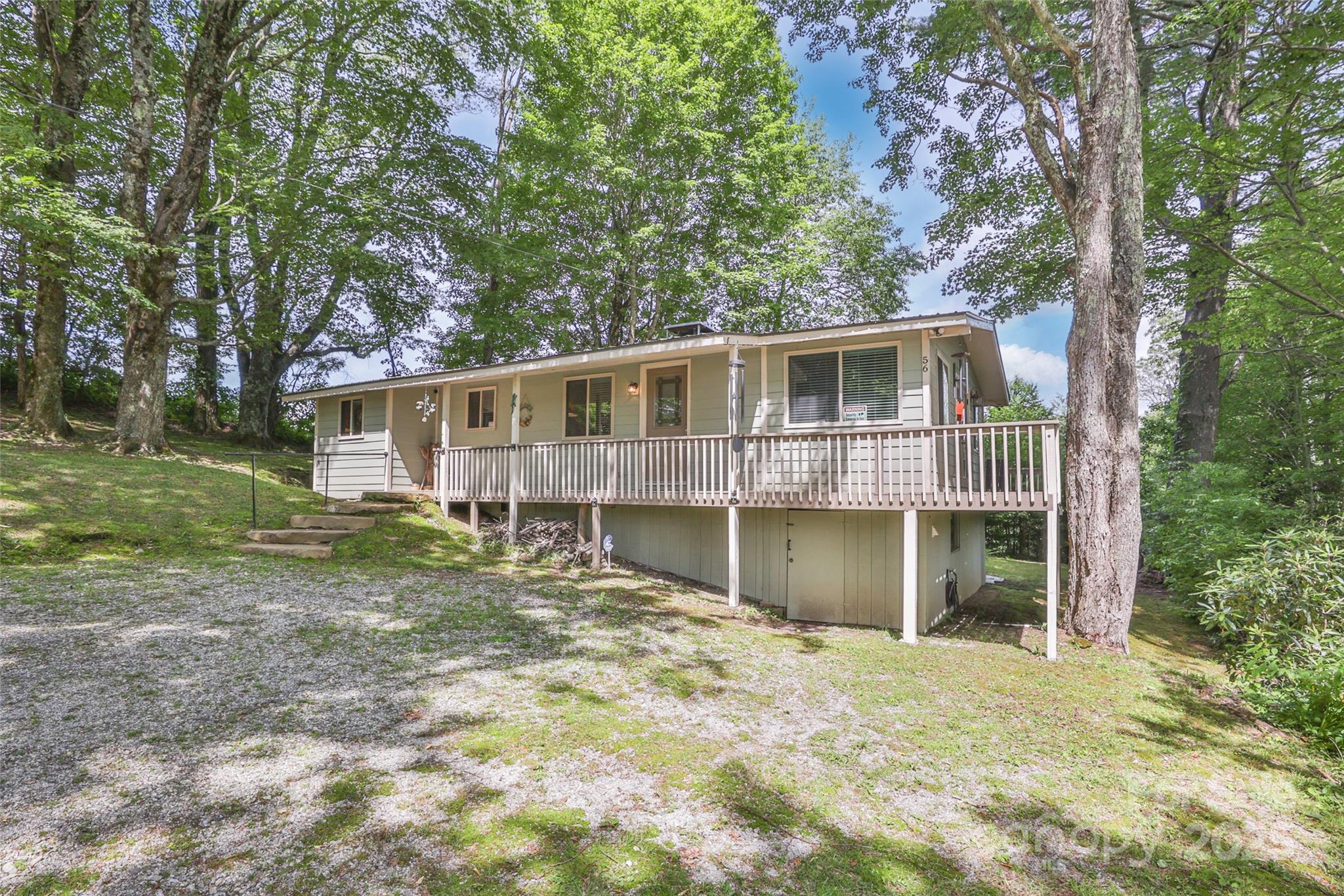 56 Faraway Drive Cullowhee, NC 28723 - Photo 1 of 46 front view of a house with a yard