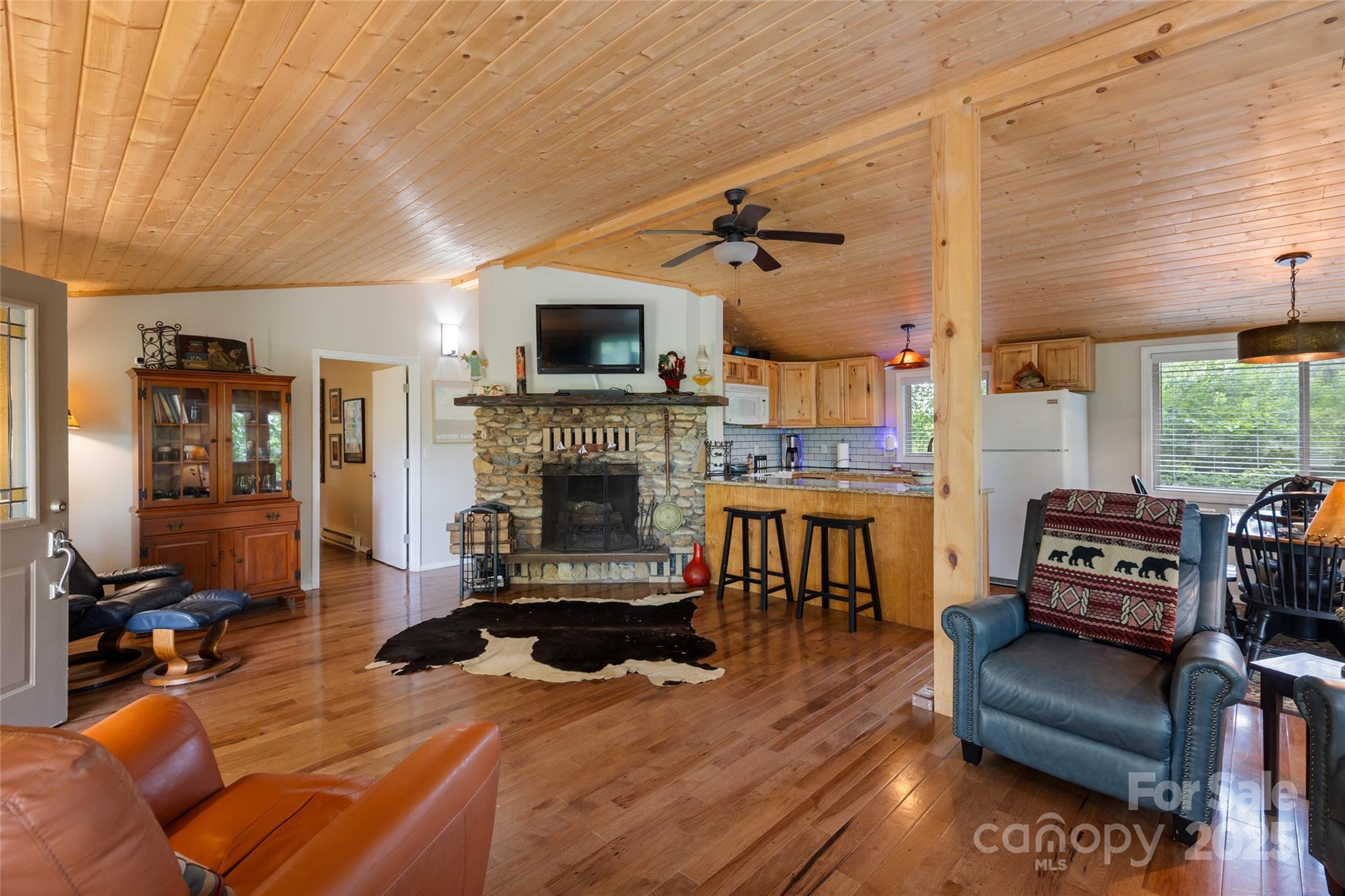 56 Faraway Drive Cullowhee, NC 28723 - Photo 12 of 46 a living room with furniture and a fireplace