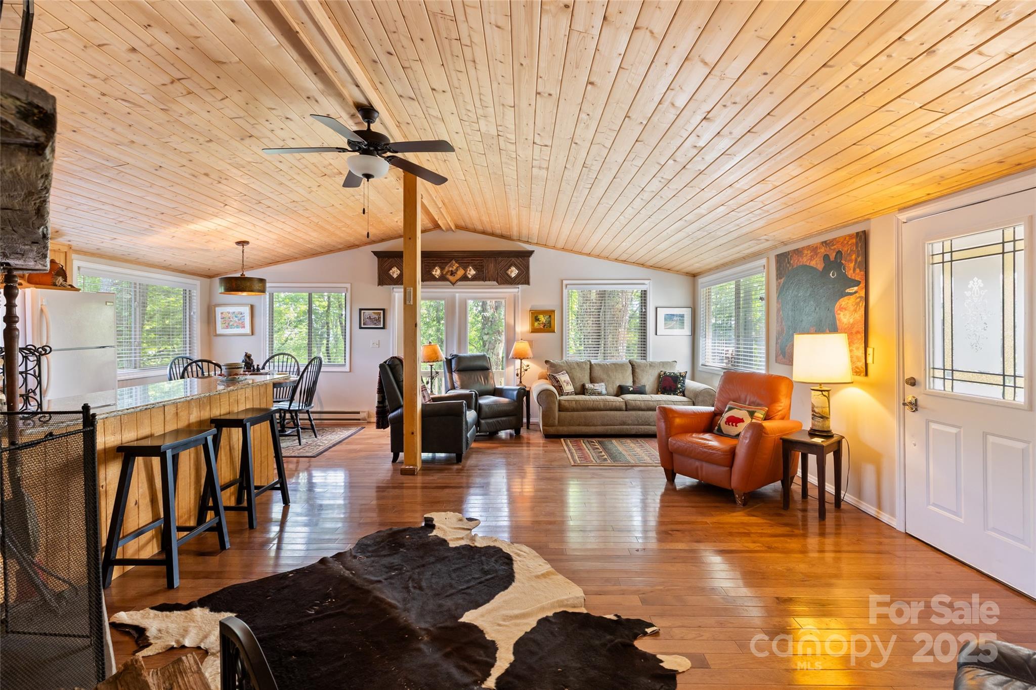 56 Faraway Drive Cullowhee, NC 28723 - Photo 21 of 46 a living room with furniture and a chandelier