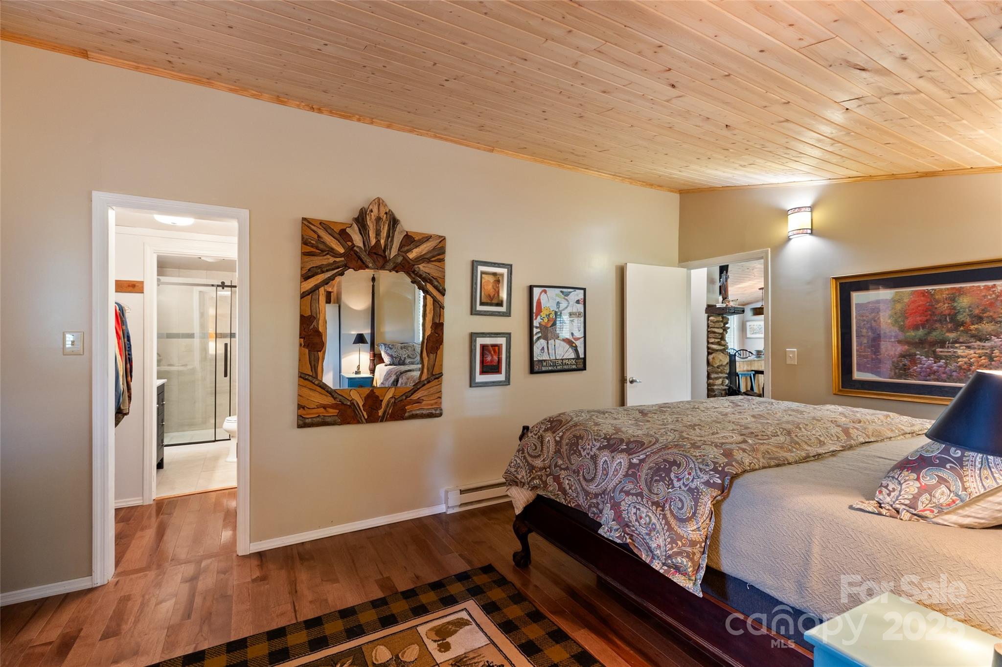 56 Faraway Drive Cullowhee, NC 28723 - Photo 32 of 46 a bedroom with a bed and wooden floor