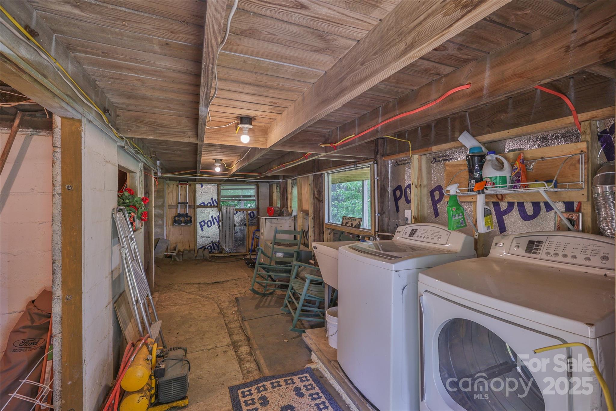 56 Faraway Drive Cullowhee, NC 28723 - Photo 40 of 46 a view of a storage & utility room with lots of appliances