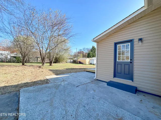a view of backyard of house