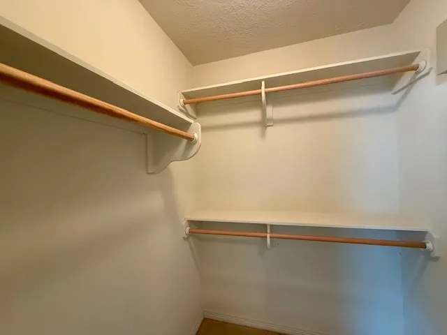 a view of a room with racks on the wall