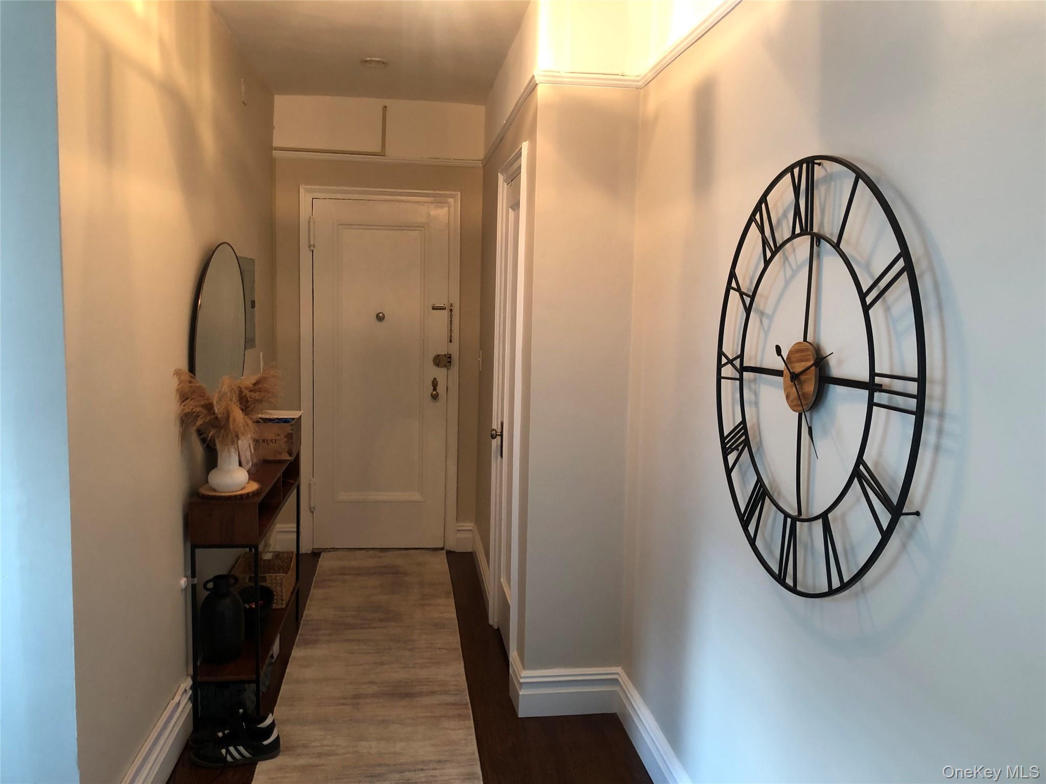 1470 Midland Avenue, Unit 3M Bronxville, NY 10708 - Photo 5 of 20 Entryway featuring wood-finish flooring and light-toned walls