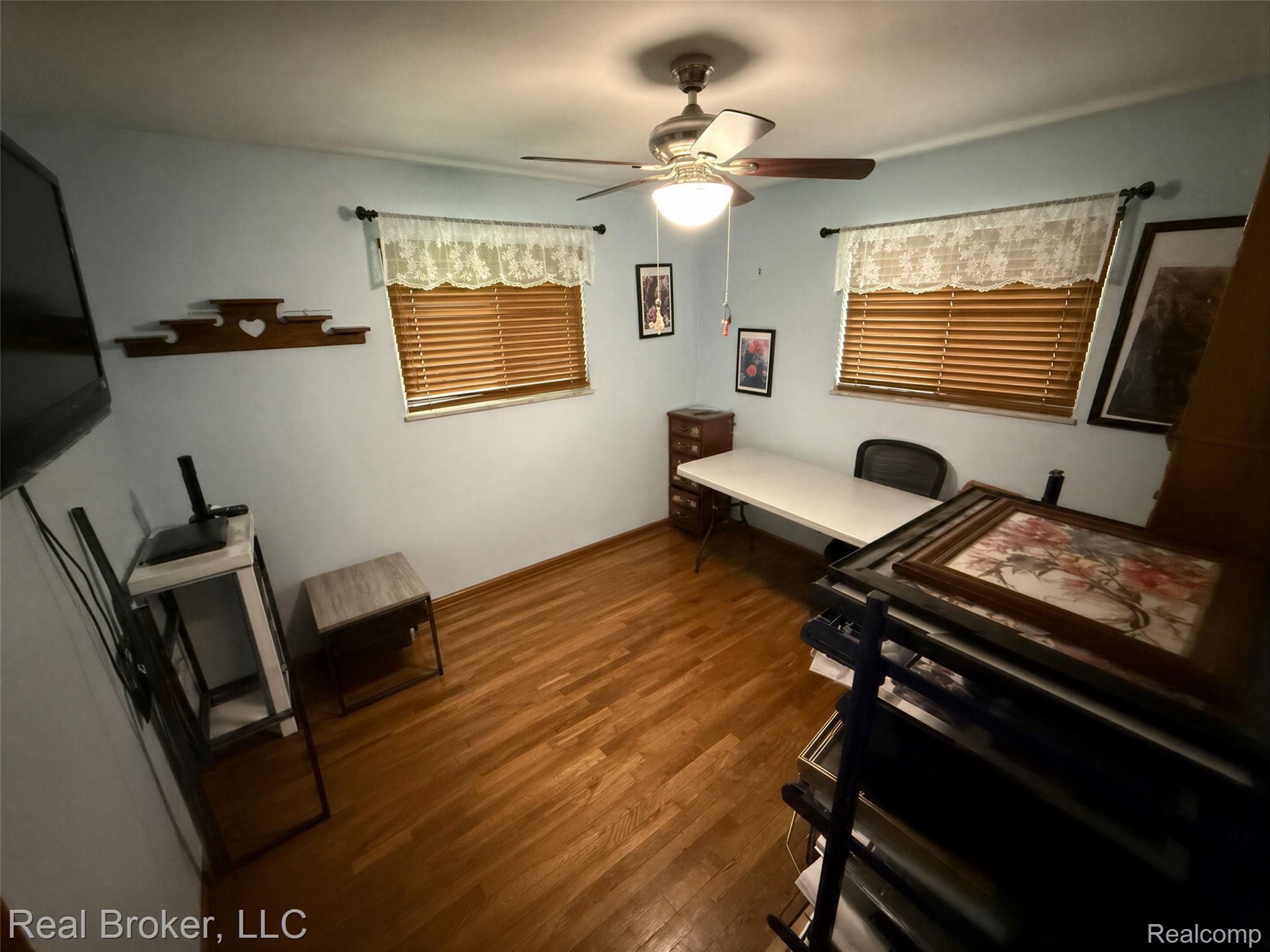 3412 South Reese Road Frankenmuth, MI 48734 - Photo 7 of 17 Office featuring dark wood-style floors and ceiling fan