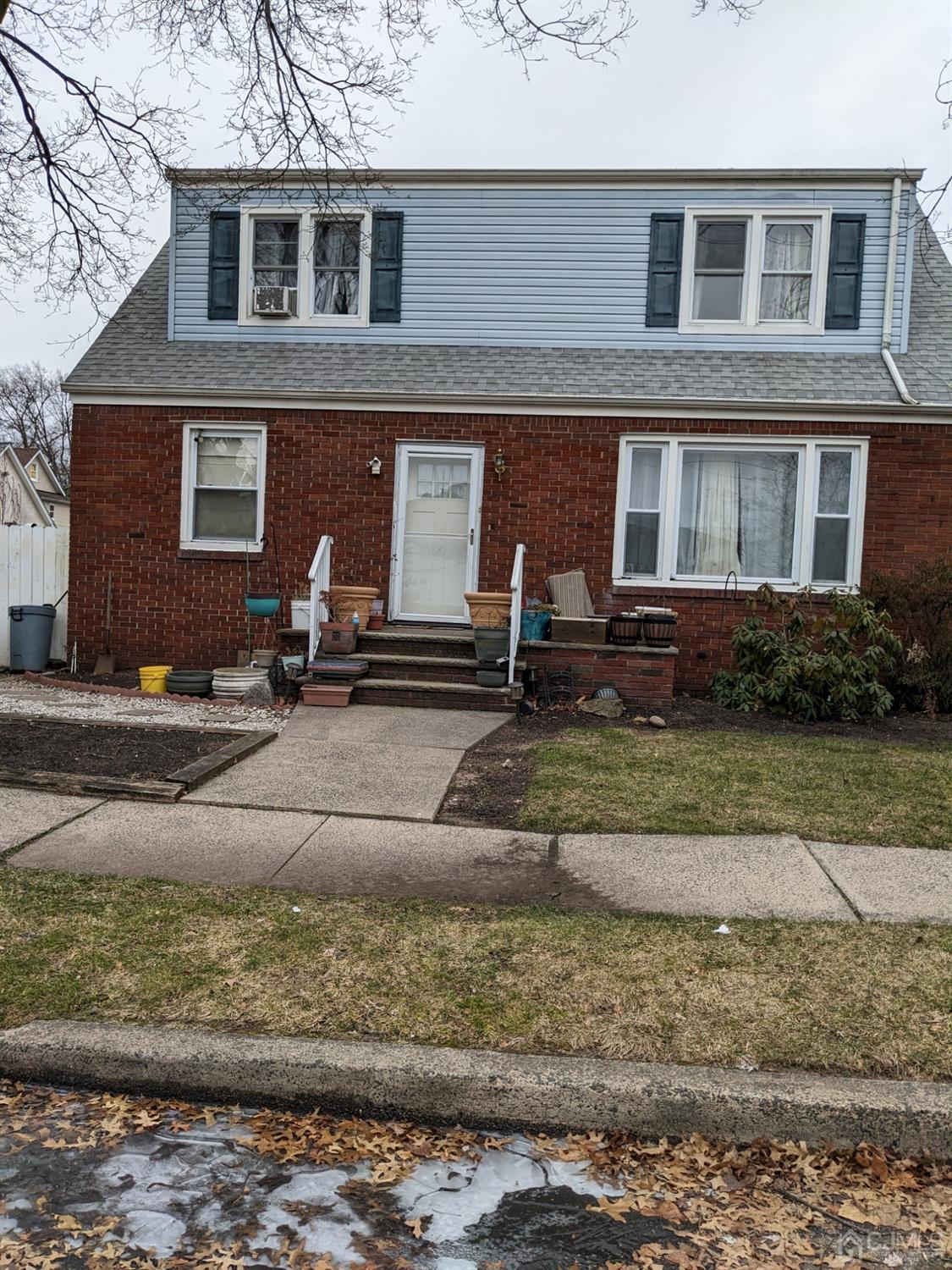 307 2nd Street Middlesex, NJ 08846 - Photo 1 of 8 a front view of a house with garden