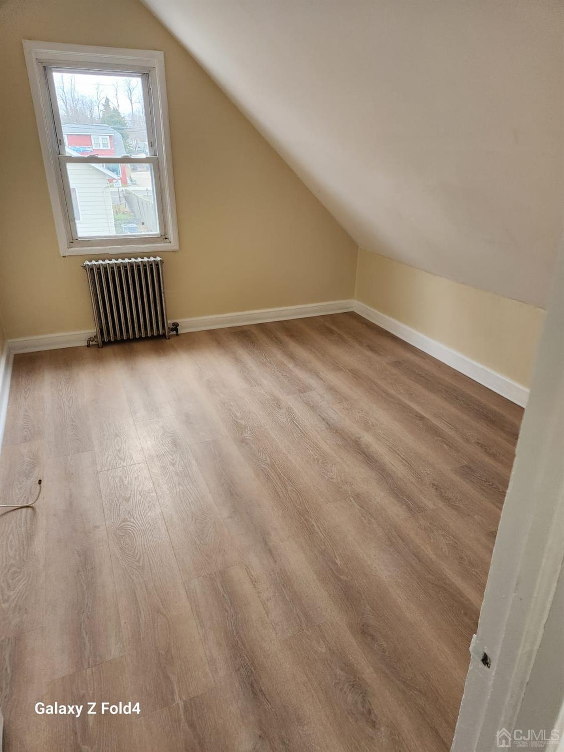 307 2nd Street Middlesex, NJ 08846 - Photo 7 of 8 a view of an empty room and window