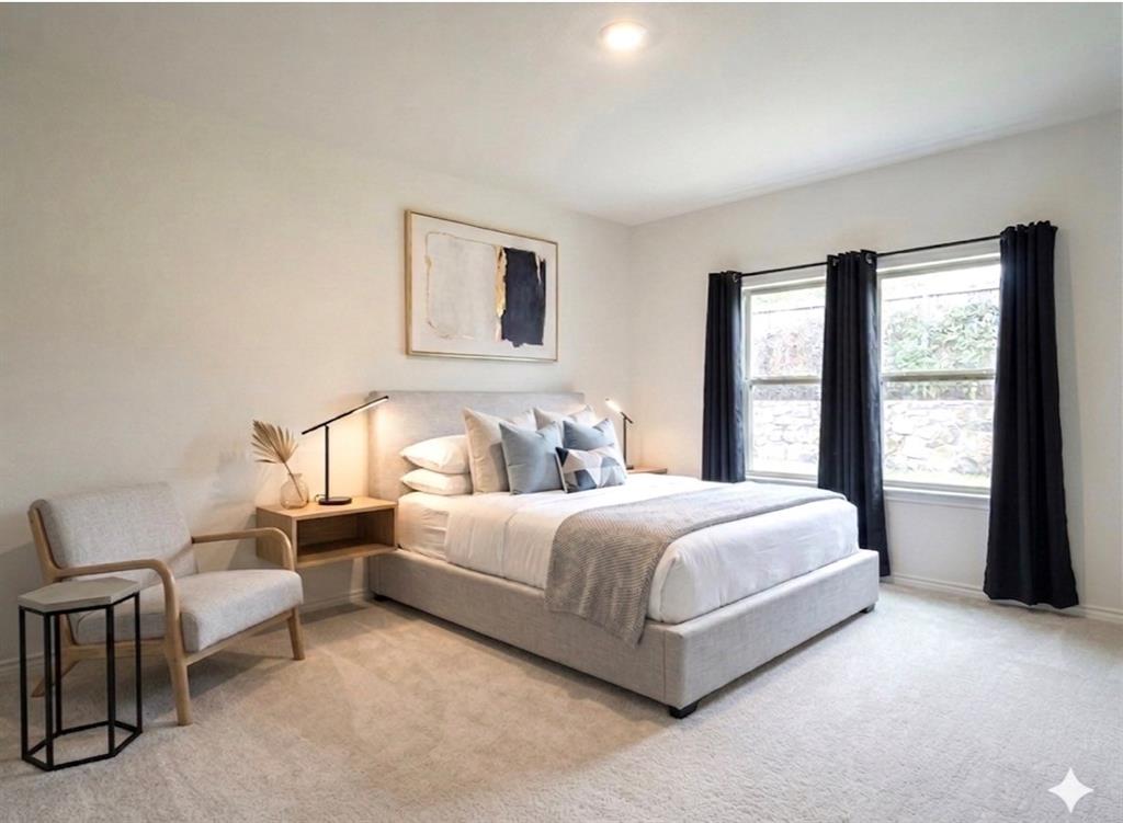 816 Country Road Royse City, TX 75189 - Photo 5 of 24 *virtually staged* Carpeted bedroom featuring a light-colored upholstered bed frame, recessed lighting, two windows with dark drapery, and a contemporary wall art piece