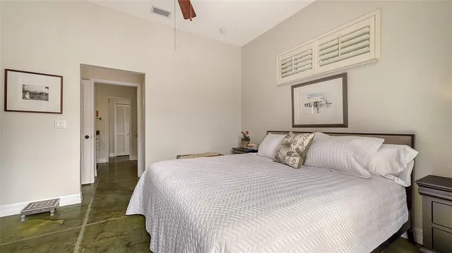 a bathroom with a sink a light fixture and a mirror