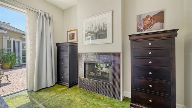 a picture of a house with a tree and plants