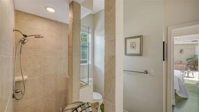 a backyard of a house with outdoor seating