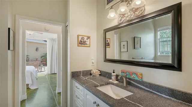 a view of a patio with couches and potted plants