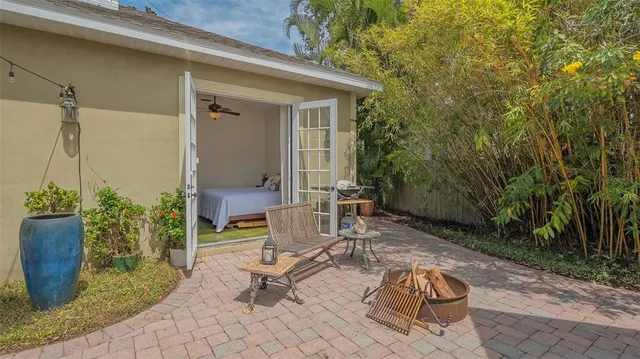 a bedroom with a bed and a table in it