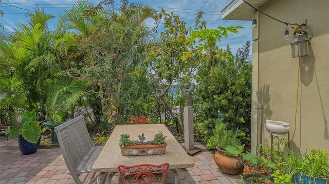 a bedroom with a bed dresser and a window