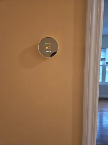 a view of a wall with a pot